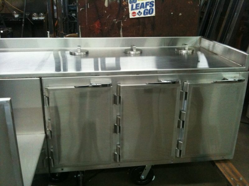Stainless steel lined cabinet for hospital, custom fabricated by Dan's Welding & Fabricating in Burlington