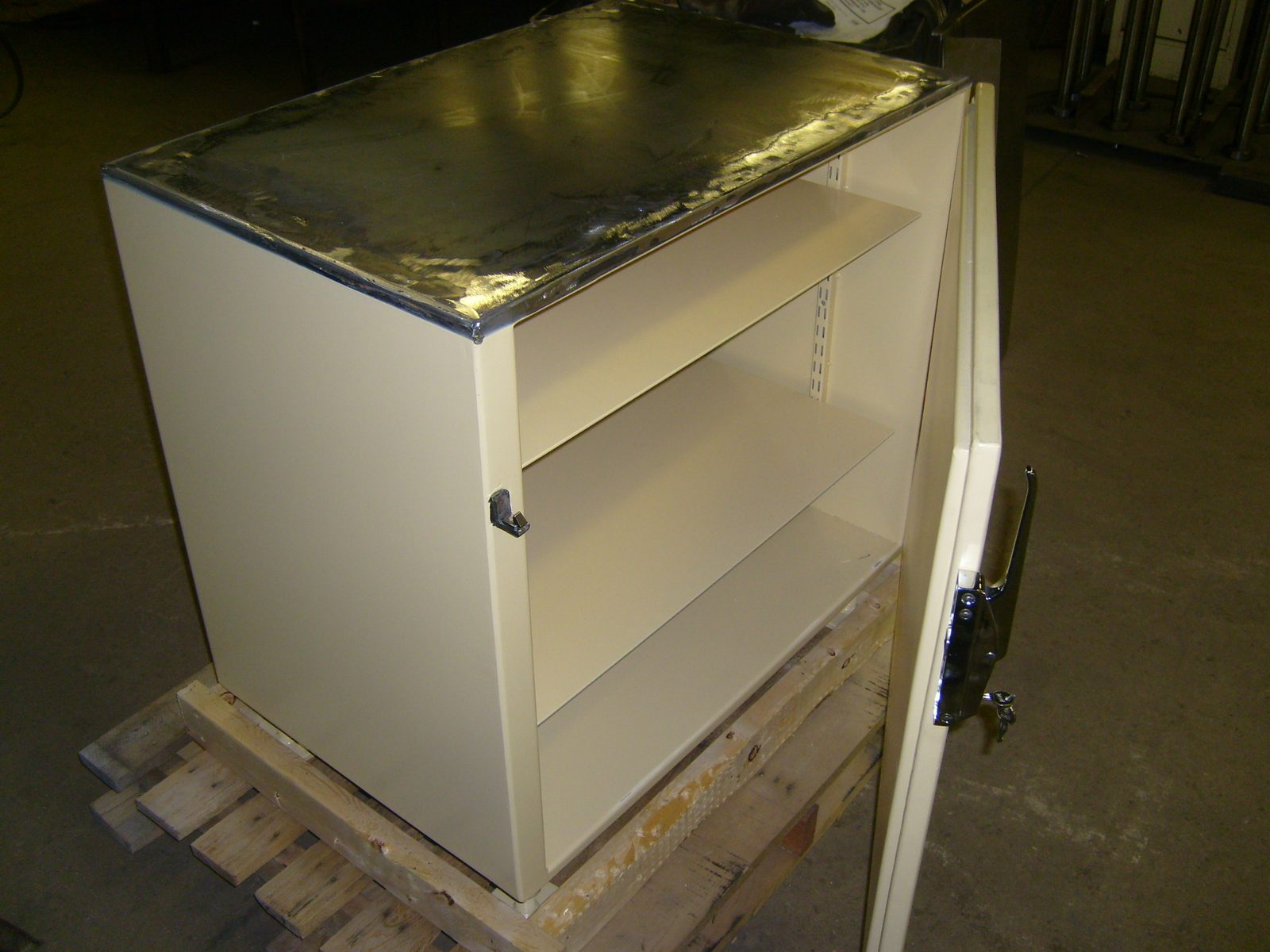 Powder-coated steel cabinet, fabricated by Dan's Welding & Fabricating in Burlington